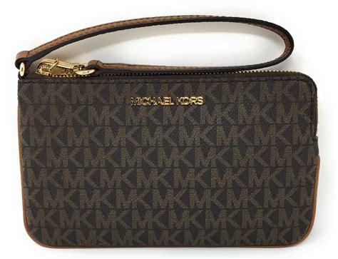 michael kors karson wallet clutch|Michael Kors large wristlet clutch.